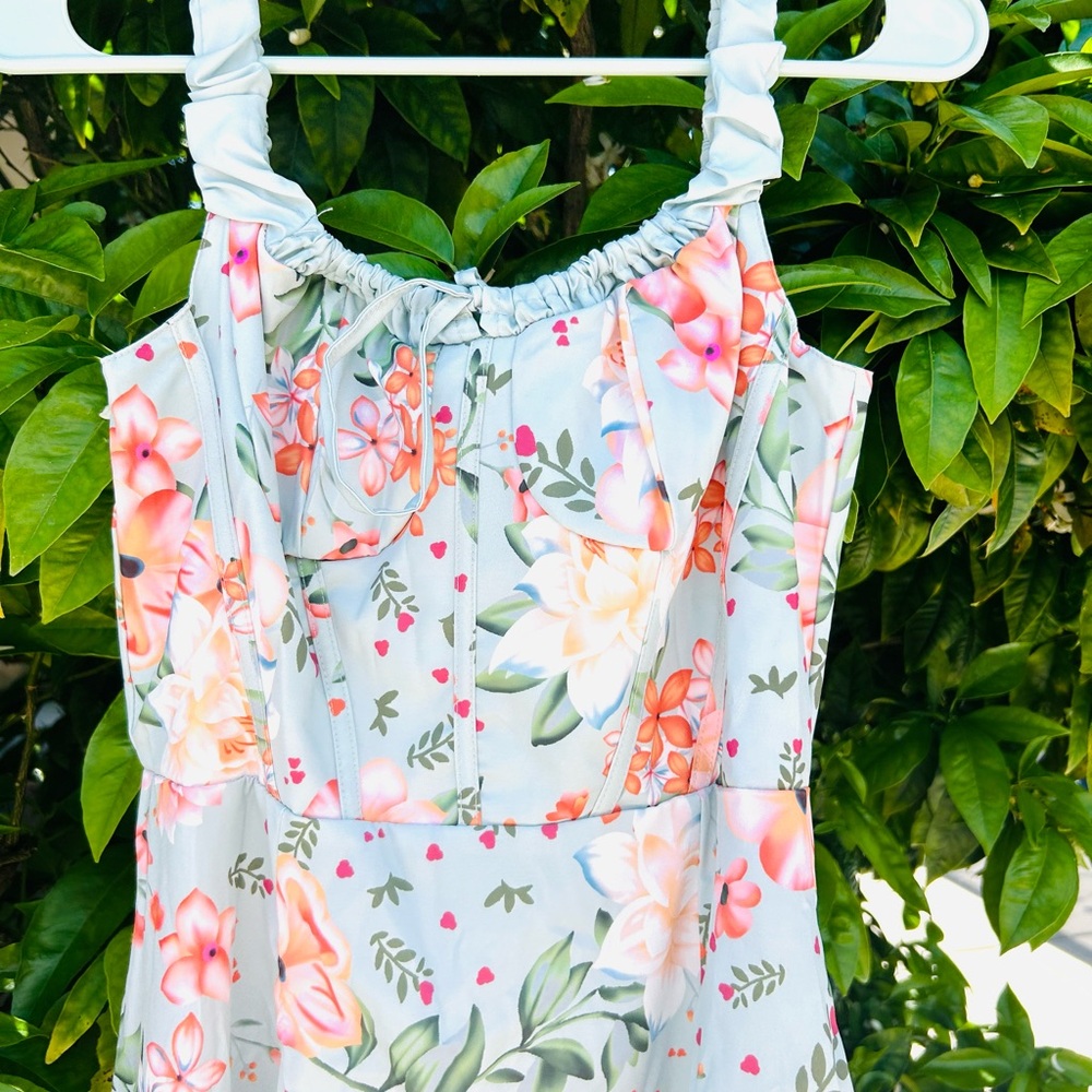 Blue floral dress.